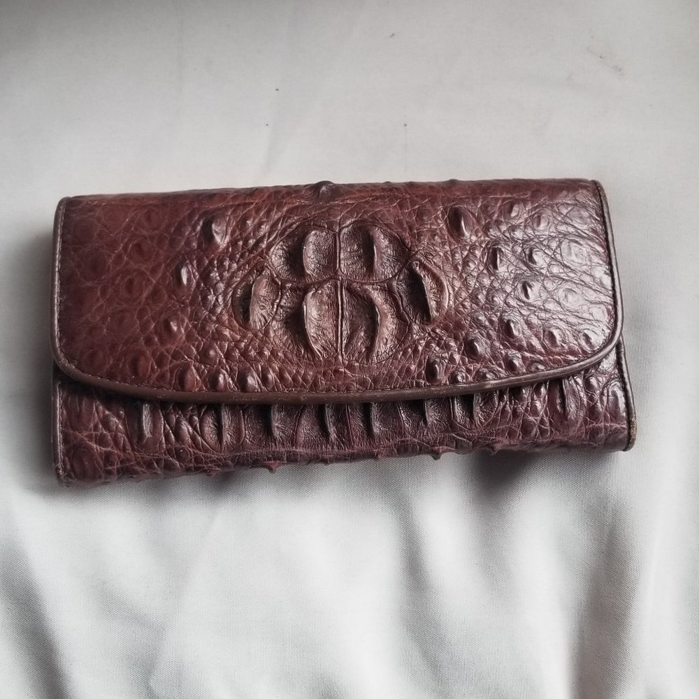 Women's brown wallet made of genuine crocodile leather